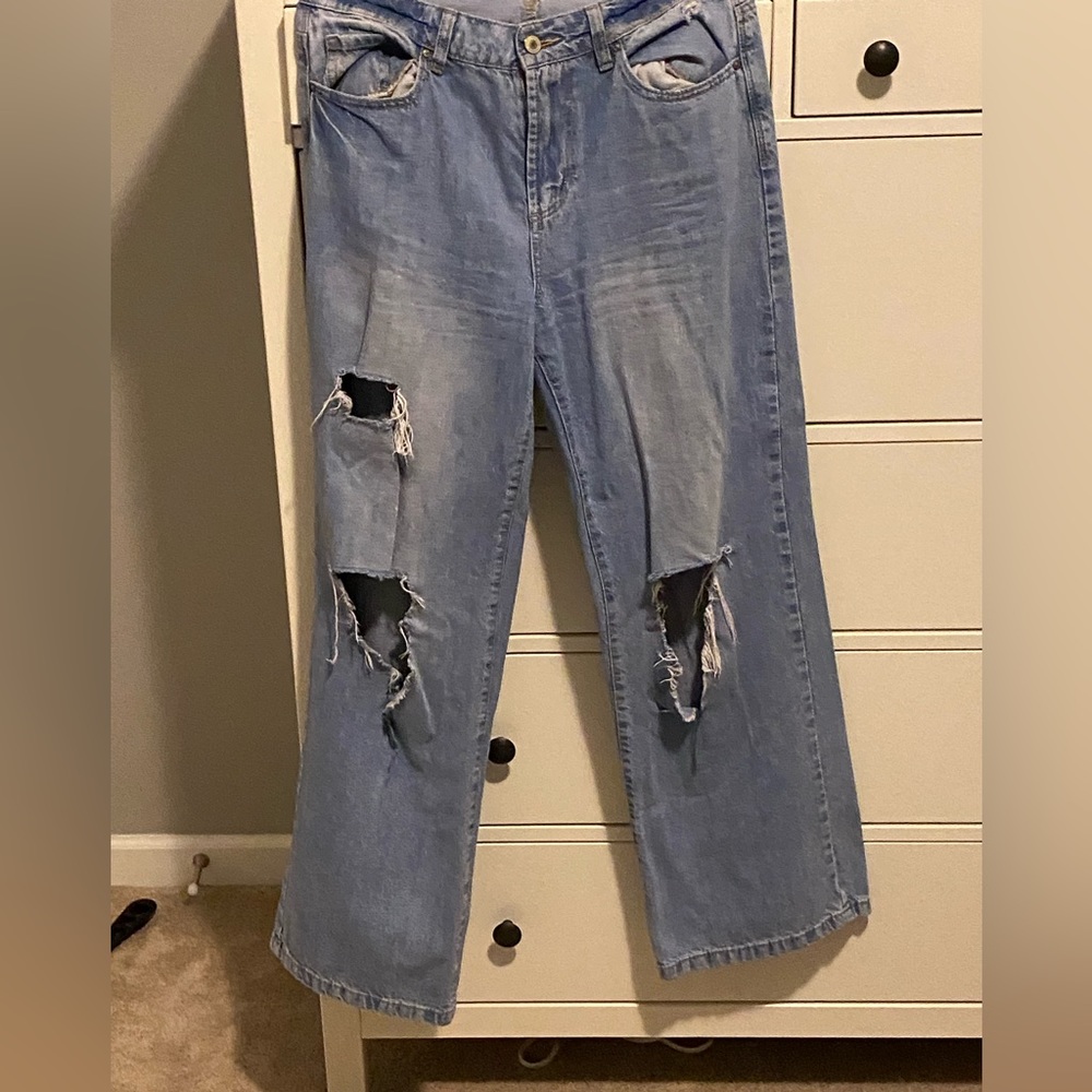 Ripped wide legged jeans